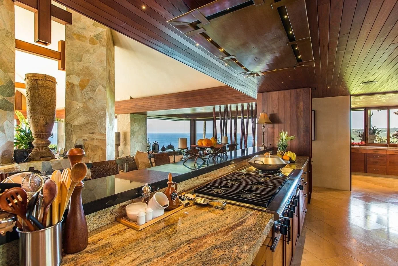 Warm island kitchen with an open view of the ocean